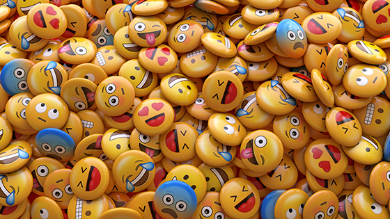 3D render of a bunch of emoji faces.